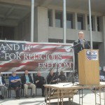 Greg Schleppenbach, Speaker, in front of US Federal Building
